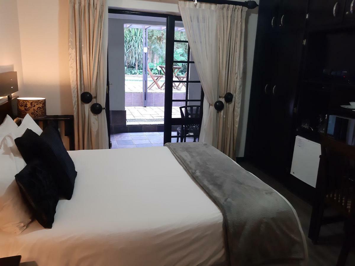 @The Villa Guest House Блумфонтейн Номер фото